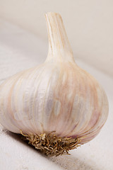 Image showing Fresh garlic bulb with loose cloves