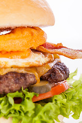 Image showing Delicious egg and bacon cheeseburger