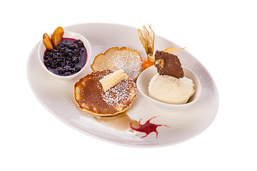 Image showing tasty sweet pancakes with vanilla icecream and topping