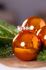 Image showing Shiny bright copper colored Christmas balls