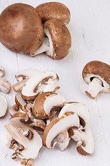 Image showing Diced and whole agaricus brown button mushrooms