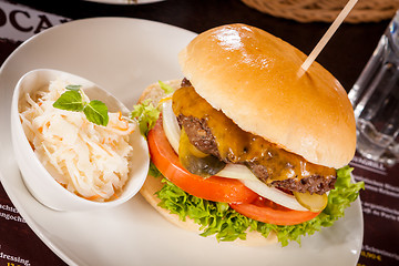 Image showing Cheeseburger with cole slaw 