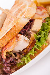 Image showing Club sandwich with potato French fries