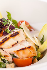 Image showing tasty fresh caesar salad with grilled chicken and parmesan 