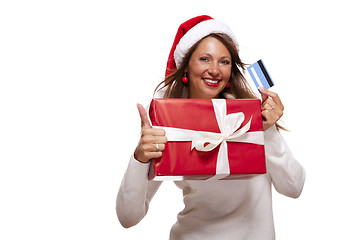 Image showing Smiling woman purchasing Christmas gifts