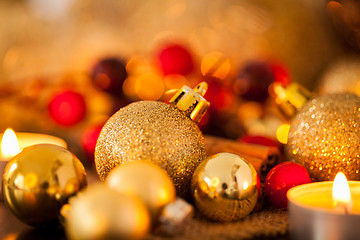 Image showing Warm gold and red Christmas candlelight background