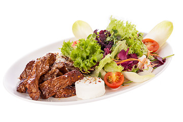 Image showing grilled beef stripes fresh salad and goat cheese