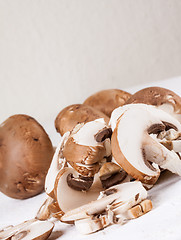 Image showing Diced and whole agaricus brown button mushrooms