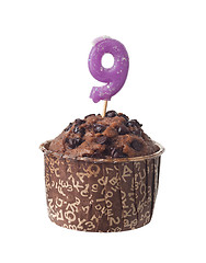 Image showing Chocolate muffin with birthday candle for nine year old