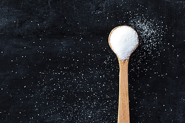 Image showing sugar in wooden spoon 