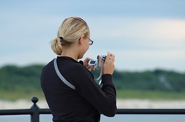Image showing Girl with Camera