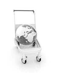 Image showing Trolley for luggage at the airport and earth. International tour