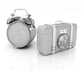 Image showing Suitcases for travel and clock