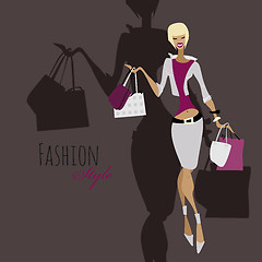 Image showing Fashion girl. Woman with shopping bags.