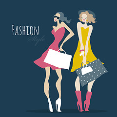 Image showing Fashion girls. Women with shopping bags.