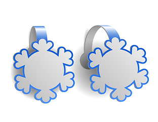 Image showing Blue advertising wobblers shaped like snowflakes