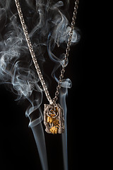 Image showing Men's pendant with a tiger in the smoke