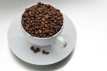 Image showing Coffee beans with cup