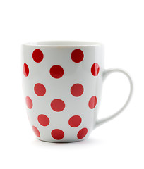 Image showing Porcelain cup with red polka dots