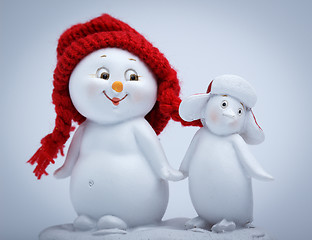 Image showing Cheerful snowman and penguin