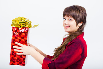 Image showing Young girl with a gift box