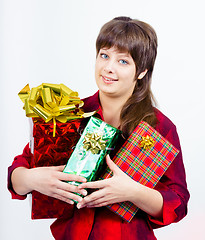 Image showing Young girl with a gift box