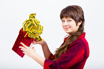 Image showing Young girl with a gift box