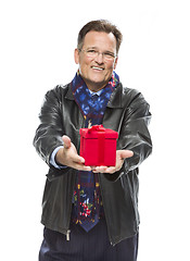 Image showing Man Wearing Black Leather Jacket Holding Christmas Gift on White