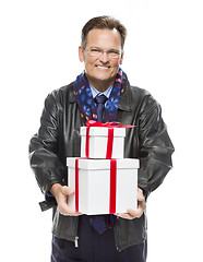 Image showing Man Wearing Black Leather Jacket Holding Christmas Gifts on Whit