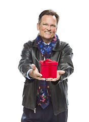 Image showing Man Wearing Black Leather Jacket Holding Christmas Gift on White