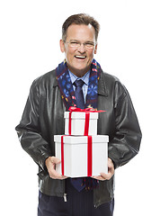 Image showing Man Wearing Black Leather Jacket Holding Christmas Gifts on Whit