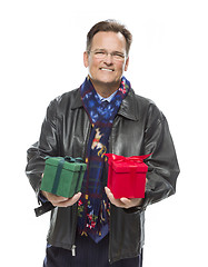 Image showing Man Wearing Black Leather Jacket Holding Christmas Gifts on Whit