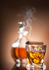 Image showing Cigar on glass