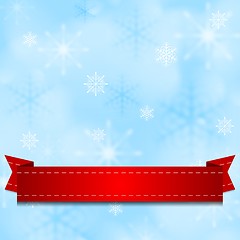Image showing Light shiny blue background with red ribbon