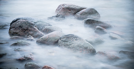 Image showing Marine stones washed by a wave, close up