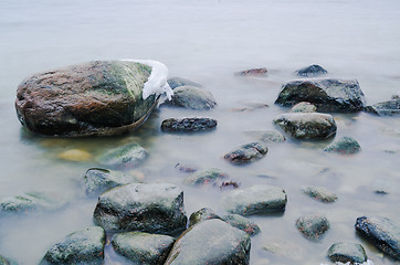 Image showing Marine stones washed by a wave, close up