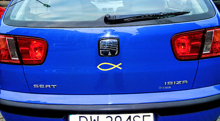 Image showing Catholic symbol on car