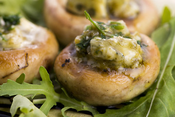 Image showing Delicious stuffed mushrooms with cheese and pesto