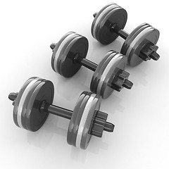 Image showing Colorful dumbbells on a white background