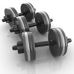 Image showing Colorful dumbbells on a white background