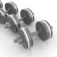 Image showing Colorful dumbbells on a white background