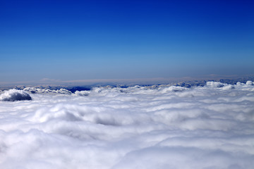 Image showing Mountains under clouds in sun day