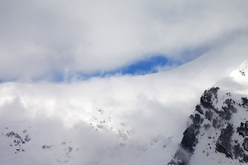 Image showing View on off-piste slope in clouds