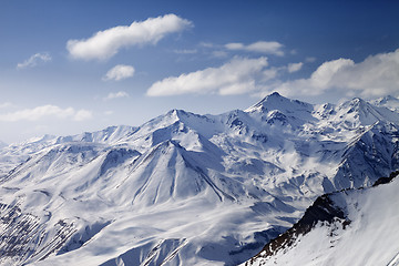 Image showing Snowy winter mountains in sun day