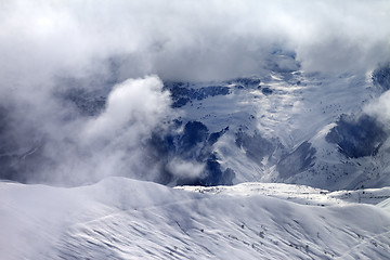 Image showing Off-piste slope in sunlight clouds
