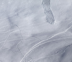 Image showing Off-piste slope with traces of skis, snowboarding and avalanche