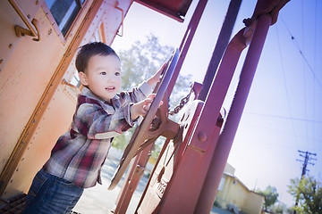 Image showing Cute Young Mixed Race Boy Having Fun on Railroad Car