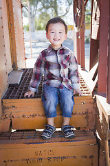 Image showing Cute Young Mixed Race Boy Having Fun on Railroad Car