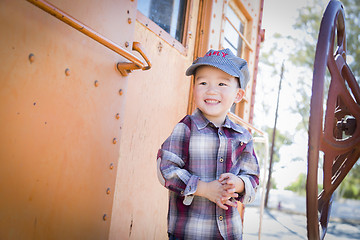 Image showing Cute Young Mixed Race Boy Having Fun on Railroad Car