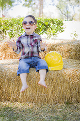 Image showing Young Mixed Race Boy Laughing with Sunglasses and Hard Hat